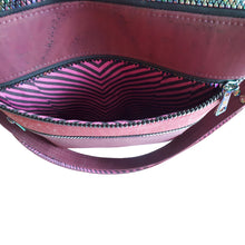 View of exterior pocket lining in pink and purple striped fabric, by just.a.tad accessories, sold by Gems from Paradise.