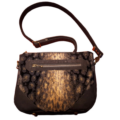 Front of Wild Thing Crossbody Bag with faux fur leopard print, cork and zipper pocket, bag by just.a.tad accessories, sold by Gems from Paradise.