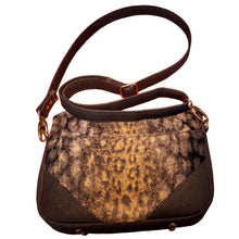 Back of Wild Thing Crossbody Bag with faux fur leopard print, cork and slip pocket, bag by just.a.tad accessories, sold by Gems from Paradise.