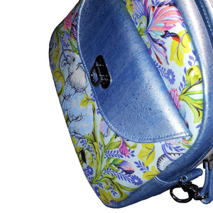 Blue Elephant Bowler Bag, angled view of front of bag with cork flap and elephant print, by just.a.tad accessories, sold by Gems from Paradise.