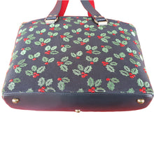 Domed handbag front and partial view of base of bag, in black linen blend fabric with embroidered green holly leaves and red berries by just.a.tad accessories, sold by Gems from Paradise.