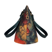 Domed handbag side view, with rectange zipper pull, watercolour-esque cork print, by just.a.tad accessories, sold by Gems from Paradise.