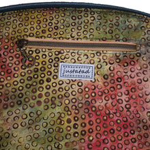 Close up on interior zipper pocket and just.a.tad label, by just.a.tad accessories, sold by Gems from Paradise.