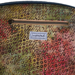 Close up on interior zipper pocket and just.a.tad label, by just.a.tad accessories, sold by Gems from Paradise.