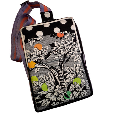 Lemur Sling Bag, front view of black & white lemur print, exterior pocket with flap, by just.a.tad accessories, sold by Gems from Paradise.