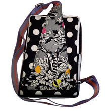 Lemur Sling Bag, back view of black & white lemur print against polka dot print and strap, by just.a.tad accessories, sold by Gems from Paradise.