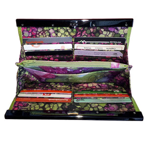 Wallet Clutch interior featuring colourful fabrics in fuchsias and greens, by just.a.tad accessories, sold by Gems from Paradise.