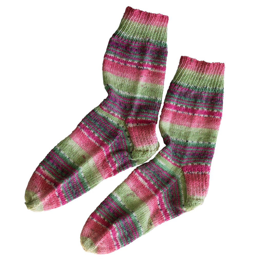 Shades of coral and green with a hint of white. These Coral Meadow Socks are handmade by Socks by Sandy and sold by Gems from Paradise.
