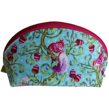 Dumpling-shaped Zip Pouch front view of fluffy-tailed squirrel and acorns in pinks and purples on blue background, by just.a.tad accessories, sold by Gems from Paradise.