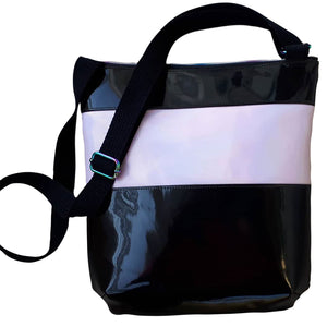 Back of Ackee 1-2-3 Triple Zip Crossbody Bag with black patent & shimmery pink vinyl by just.a.tad accessories, sold by Gems from Paradise.