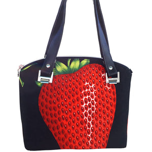 Domed handbag front, in Alexander Henry's "Very Strawberry" fabric with black background by just.a.tad accessories, sold by Gems from Paradise.