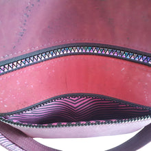 View of bottom exterior pocket lining in pink and purple striped fabric, by just.a.tad accessories, sold by Gems from Paradise.